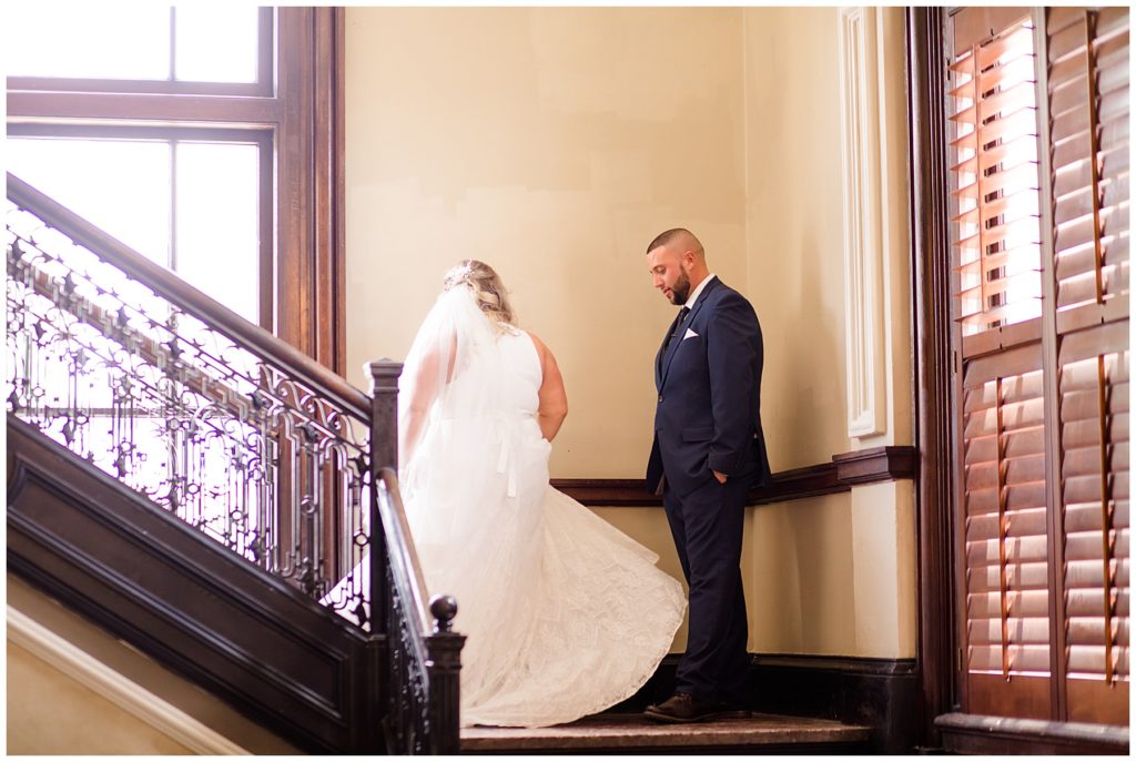 bride twirling on steps at the postmark