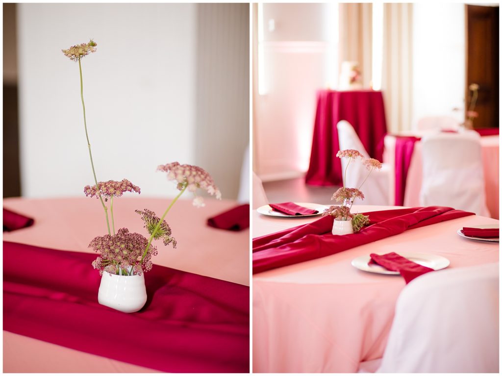 pink and burgundy table decorations at the postmark
