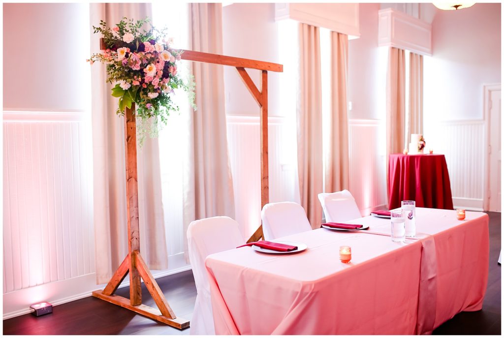 wedding reception with pink uplighting at the postmark