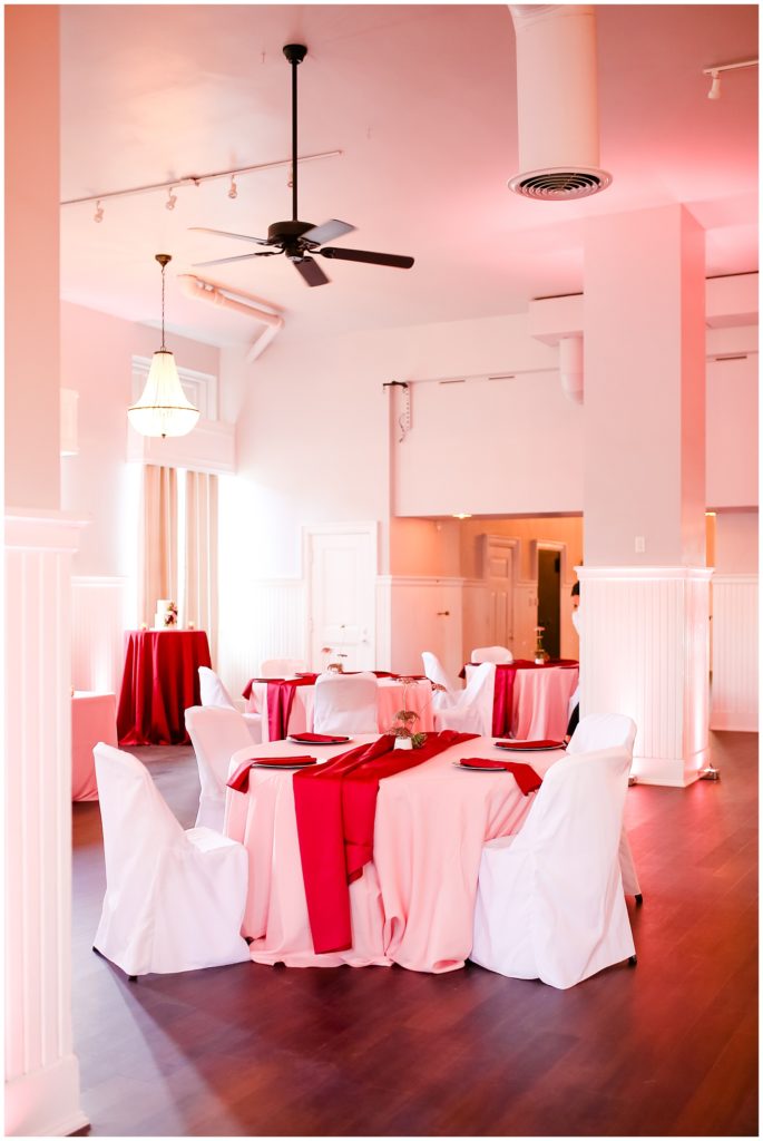 wedding reception room setup at the postmark